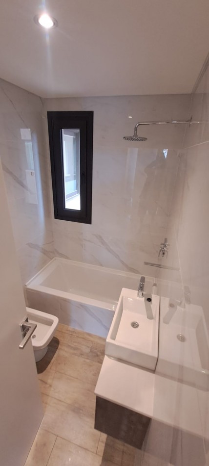 2 AMBIENTES A ESTRENAR CON COCHERA - EDIFICIO GENUS - LA RIOJA 3728